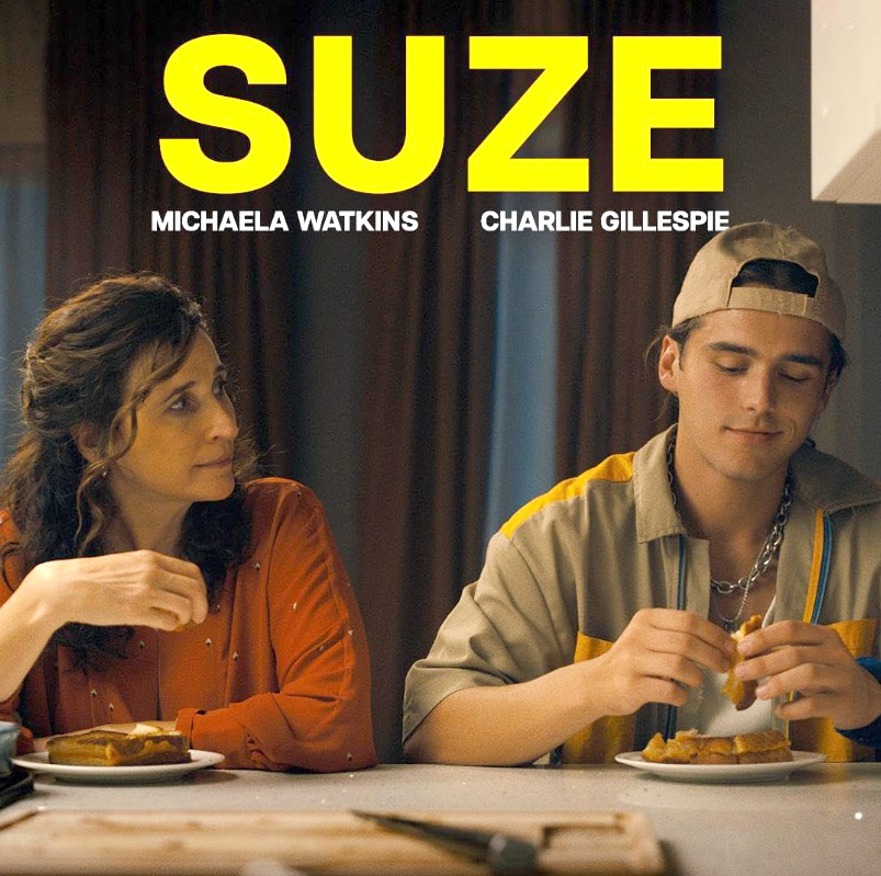 Michaela Watkins and Charlie Gillespie in Suze